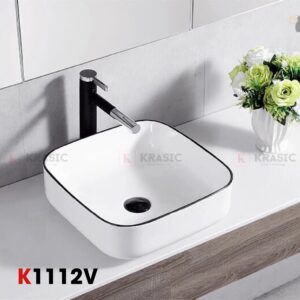 Thông tin cơ bản Lavabo Krasic K1112V - Viền đen Màu sắc: Trắng viền đen Tráng men công nghệ cao, Chất liệu sứ siêu bền Chống bám bẩn, lau rửa dễ dàng Kích thước: 500*400*145mm